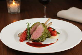 Herb-Crusted New Zealand Lamb Rack with Roasted Vegetables