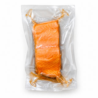 Akaroa Manuka hot smoked King salmon 130g vacuum-packed portion on a clean white background